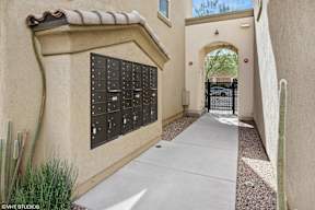 A wall with mailboxes on it.