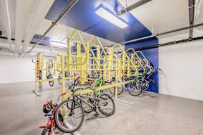 A bike rack with many bikes on it.