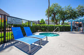 A pool area with a caution no diving sign.