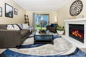 Copper Ridge Apartments in Renton, Washington Model Living Room with Fireplace