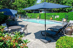 Copper Ridge Apartments in Renton, Washington Pool with Lounge Chairs