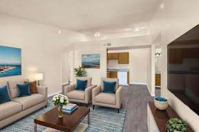 A living room with a couch, chairs, and a coffee table.