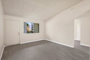 A room with a door and a window.