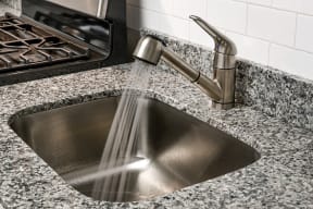The Osprey Apartments Kitchen Sink and Faucet