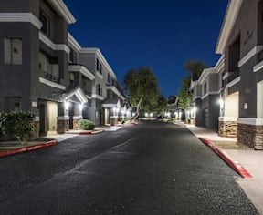 Apartment complex with a clear blue sky above.
