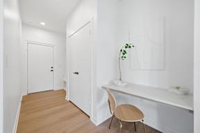 A room with a desk and chair.