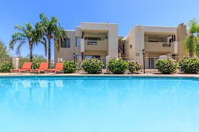 Siena Villas Apartments in Tucson, Arizona Exterior and Pool with Lounge Chairs