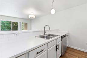Kitchen white counter top at River Walk Apartments, Boise, 83702