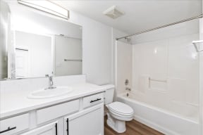 Bathroom with white interior at River Walk Apartments, Boise, 83702