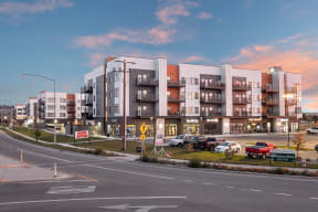 a rendering of an apartment complex with cars parked in front of it  at Shiloh Commons, Billings, MT 59102