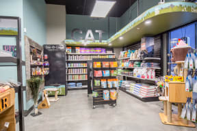 a cat store with a blackboard and shelves of cat products at Shiloh Commons, Montana