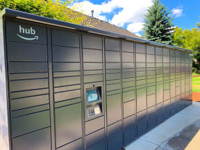 24-Hour Amazon Hub Package Locker located outside at Sir Charles Court Apartments, OR 97006