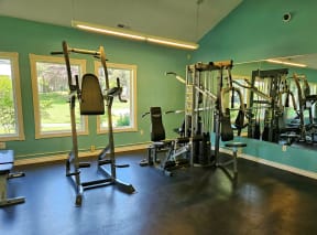 fitness center strength equipment at Sir Charles Court Apartments, Oregon