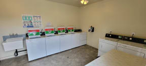 On-site laundry facilities at Magnolia Apartments in Riverside, California.