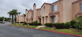 Quiet street of townhomes at Palos Verdes Village in Moreno Valley, CA.