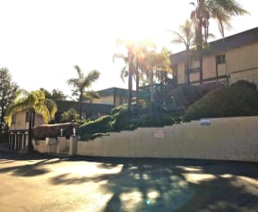 Street view of enterance at Tulip Street Apartments in Escondido, California.