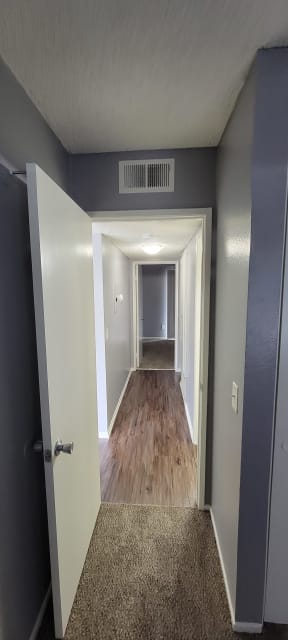 Bedroom hallway at Grand Oaks Apartments in Lake Elsinore, California.