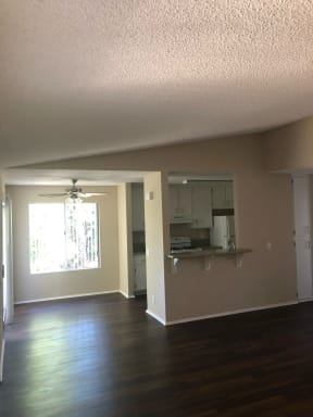 Beautiful wood plank style flooring through out the living room, dining room and kitchen areas at Grande Vista Apartments.
