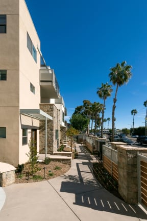Private front walkway to apartments at Villa Grande Apartments in San Diego, California.