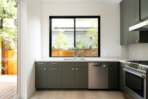 Kitchen with great window views and stainless steel apliances at 633 Palms Blvd. apartments in Venice, California.