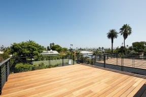 Large private wooden deck with fantastic view in apartment at 633 Palms Blvd. in Venice, California.