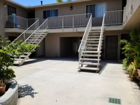 Inner court with apartment enterances at Zenith Place Apartments in Chula Vista, California.