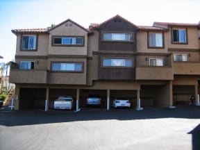 Covered parking and private balconies at Grande Vista Apartments.