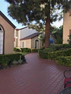 Elegant pathways between buildings at Northwood Apartments in Upland, California.
