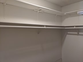 Bedroom walk-in closet at the Steckel Apartments in Santa Paula, California.