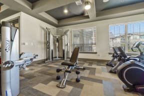 Fitness equipment in a room with windows