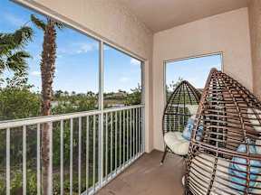 Picture of balcony with two sitting chairs