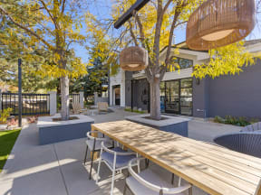 outdoor dining area with landscaping