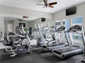 a fitness center with treadmills