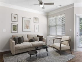a living room with a couch and a table