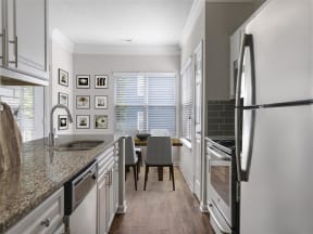 kitchen with a fridge and cabinets