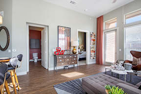 a living room with a couch and a dresser