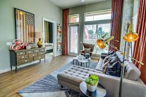 a living room with a couch and a table
