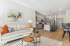 a living room with a couch and a table