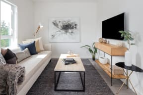 a living room with a couch and a coffee table