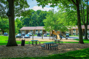 grilling station and playground at Atlantic Pointe Apartments, New Jersey, 07716