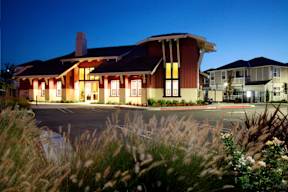 the building where the motel is located is lit up at night