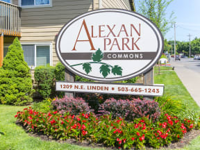 the sign in front of alexaan park commons