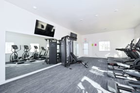 the gym at the flats at big tex apartments