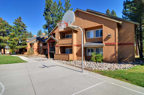 a basketball hoop in front of a building