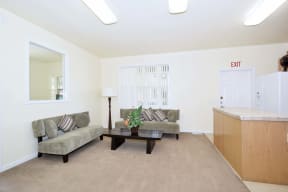 a living room with a couch and a table