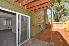 a view of the back of the house from the patio