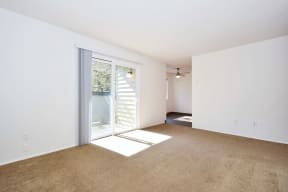 Crescent Ridge bedroom with a sliding glass door and a carpeted floor