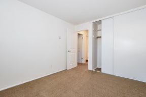 Crescent Ridge bedroom with white walls and carpet