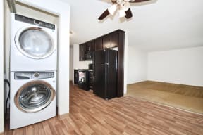 a laundry room with a washer and dryer