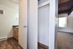 a bedroom with a bed and a mirror
